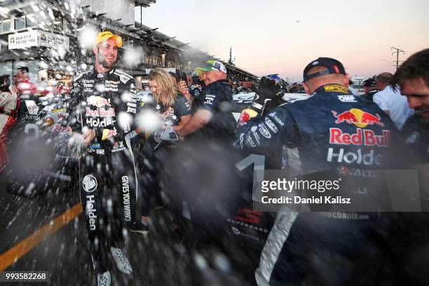 Shane Van Gisbergen driver of the Red Bull Holden Racing Team Holden Commodore ZB celebrates after winning race 18 of the Supercars Townsville 400 on...