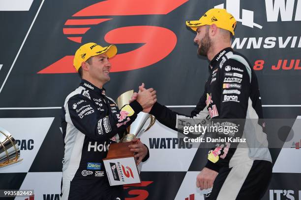 Jamie Whincup driver of the Red Bull Holden Racing Team Holden Commodore ZB and Shane Van Gisbergen driver of the Red Bull Holden Racing Team Holden...