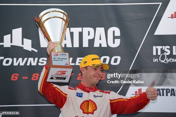 3rd place Scott McLaughlin driver of the Shell V-Power Racing Team Ford Falcon FGX celebrates on the podium during race 18 of the Supercars...