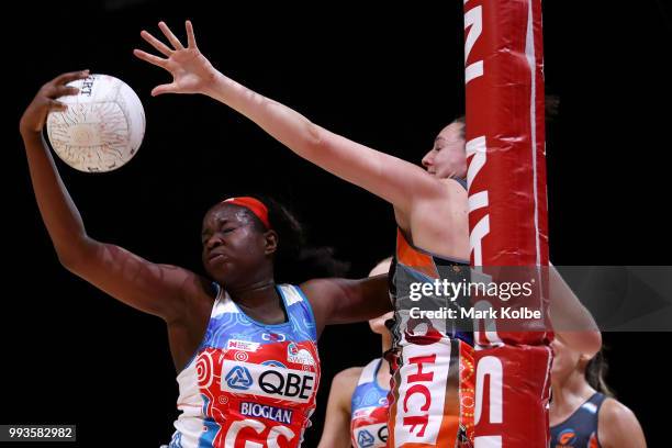 Sam Wallace of the Swifts wins the ball over Bec Bulley of the Giants during the round 10 Super Netball match between the Giants and the Swifts at...