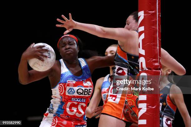 Sam Wallace of the Swifts wins the ball over Bec Bulley of the Giants during the round 10 Super Netball match between the Giants and the Swifts at...