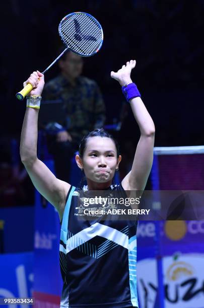 Tai Tzu Ying of Taiwan celebrates her win over Chen Yufei of China during the women's singles badminton final match at the Indonesia Open in Jakarta...