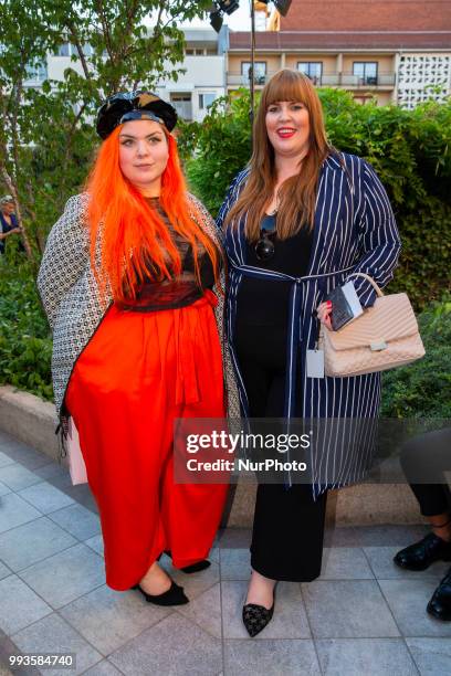 Tanja Marfo and guest attend the Marcel Ostertag Fashion Show during the Berlin Fashion Week Spring/Summer 2019 in Berlin, Germany on July 4, 2018.