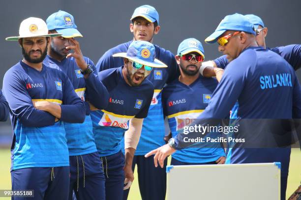 Sri Lanka Cricket Batting Coach Thilan Samaraweera talks with team members during a practice session at the R. Premadasa Stadium in Colombo on July...