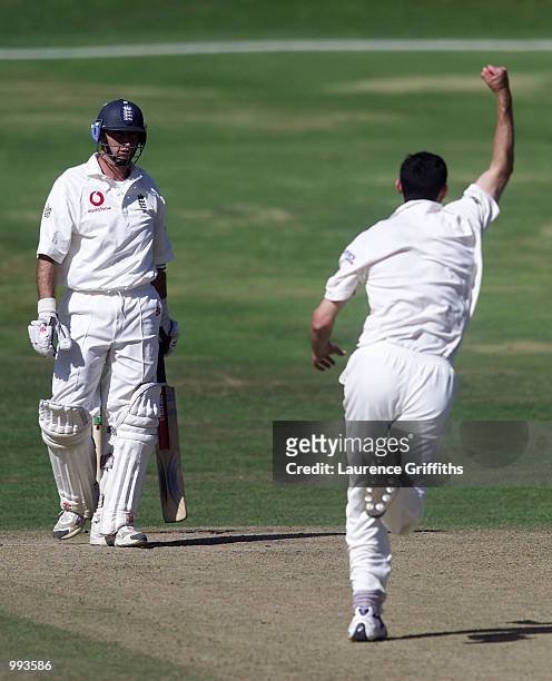 Jason Gillespie of Australia celebrates the wicket of Nasser Hussain of England during the 5th days play of the 4th Test Match between England and...