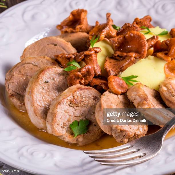 mashed potatoes with pork medallions and chanterelle sauce - mashed stock pictures, royalty-free photos & images