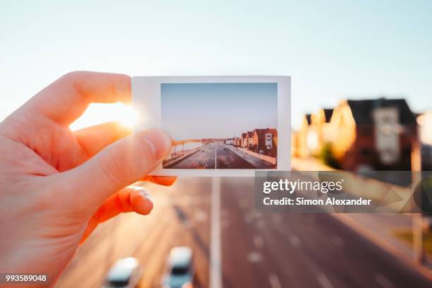 golden hour instax - instax stock pictures, royalty-free photos & images