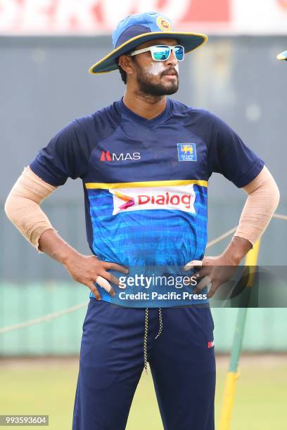 Sri Lankan cricket captain Dinesh Chandimal looks on at a practice session at the R.Premadasa Stadium in Colombo on July 6, 2018. Sri Lanka and South...