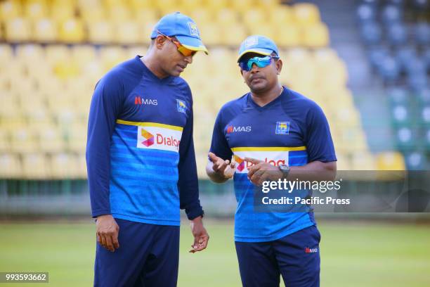 Sri Lanka Left arm bowler Rangana Herath and Batting Coach Thilan Samaraweera speak at a practice session at the R.Premadasa Stadium in Colombo on...