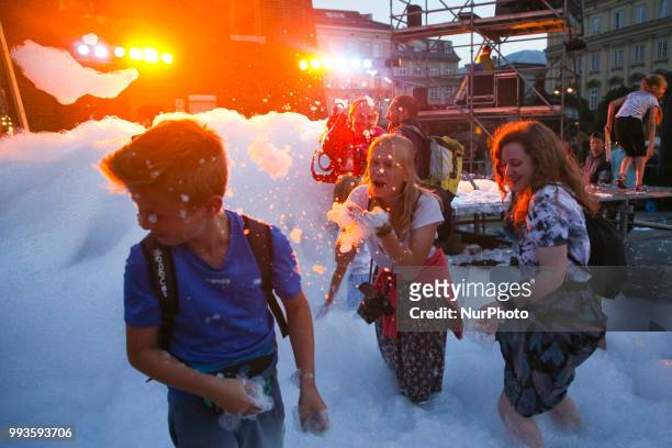 Children play in foam after ' Foam days ' performed by The Engineering Theatre AKHE from Russia during the 31. ULICA International Street Theatre...
