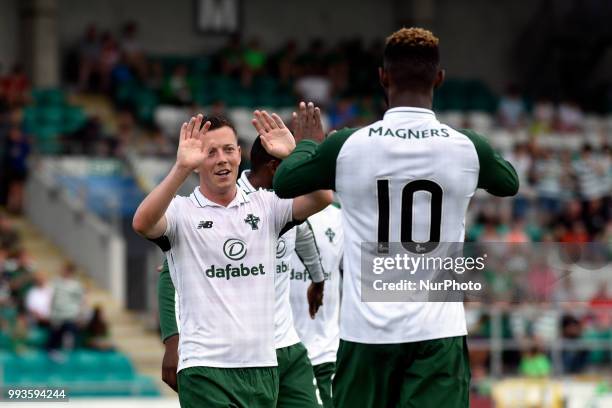 Callum McGregor and Moussa Dembele of Celtic celebrate scoring during the Club Friendly match between Shamrock Rovers and Celtic FC at Tallaght...