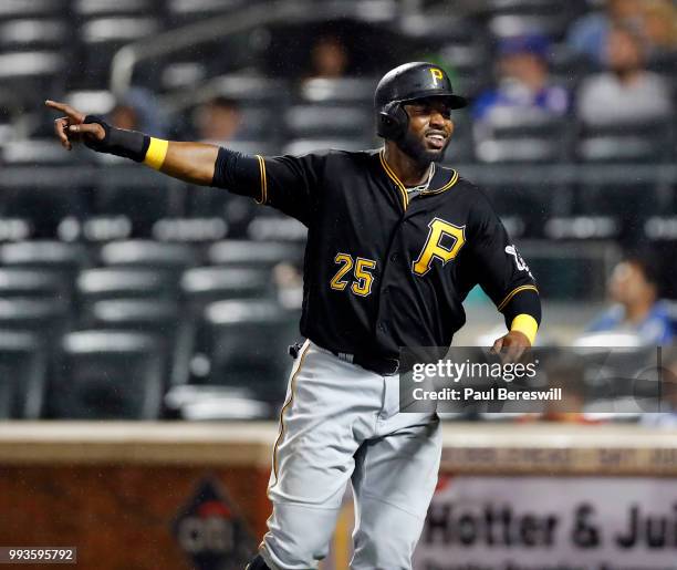 Gregory Polanco of the Pittsburgh Pirates celebrates after scoring a run in the ninth inning in an MLB baseball game against the New York Mets on...