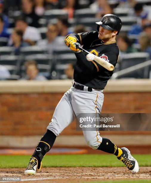 Corey Dickerson of the Pittsburgh Pirates bats in an MLB baseball game against the New York Mets on June 27, 2018 at Citi Field in the Queens borough...