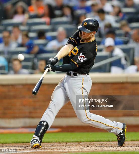 Corey Dickerson of the Pittsburgh Pirates bats in an MLB baseball game against the New York Mets on June 27, 2018 at Citi Field in the Queens borough...