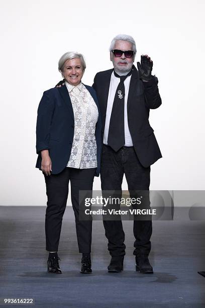 Fashion designers Karl Lagerfeld and Silvia Venturini Fendi walk the runway during the Fendi Couture Haute Couture Fall Winter 2018/2019 fashion show...