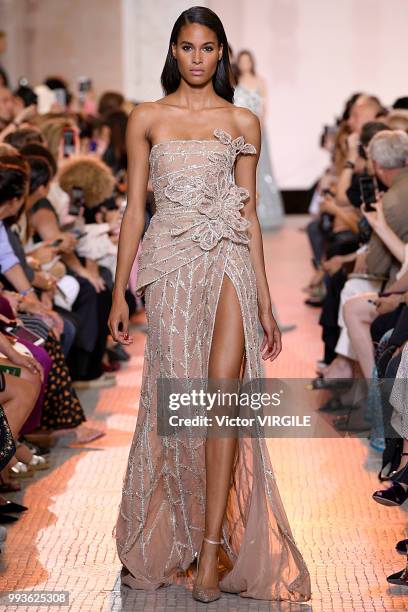 Cindy Bruna walks the runway during the Elie Saab Haute Couture Fall Winter 2018/2019 fashion show as part of Paris Fashion Week on July 4, 2018 in...