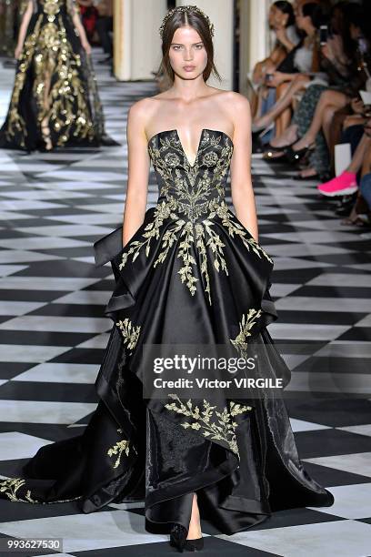 Model walks the runway during the Zuhair Murad Haute Couture Fall Winter 2018/2019 fashion show as part of Paris Fashion Week on July 4, 2018 in...