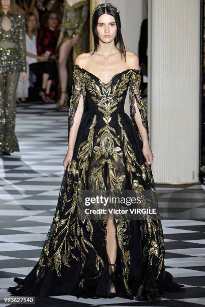 Model walks the runway during the Zuhair Murad Haute Couture Fall Winter 2018/2019 fashion show as part of Paris Fashion Week on July 4, 2018 in...