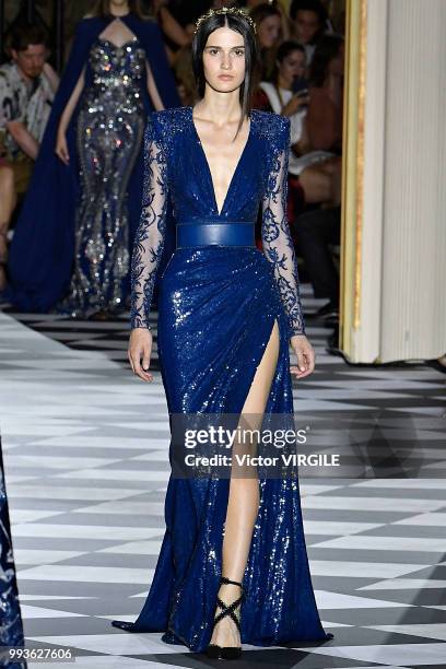 Model walks the runway during the Zuhair Murad Haute Couture Fall Winter 2018/2019 fashion show as part of Paris Fashion Week on July 4, 2018 in...