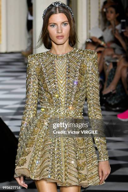 Model walks the runway during the Zuhair Murad Haute Couture Fall Winter 2018/2019 fashion show as part of Paris Fashion Week on July 4, 2018 in...