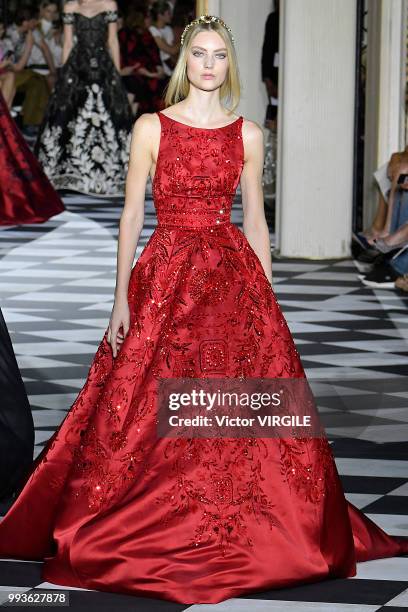 Model walks the runway during the Zuhair Murad Haute Couture Fall Winter 2018/2019 fashion show as part of Paris Fashion Week on July 4, 2018 in...