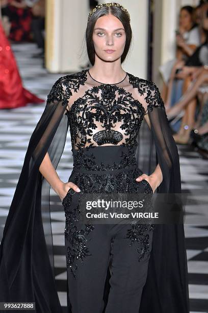 Model walks the runway during the Zuhair Murad Haute Couture Fall Winter 2018/2019 fashion show as part of Paris Fashion Week on July 4, 2018 in...