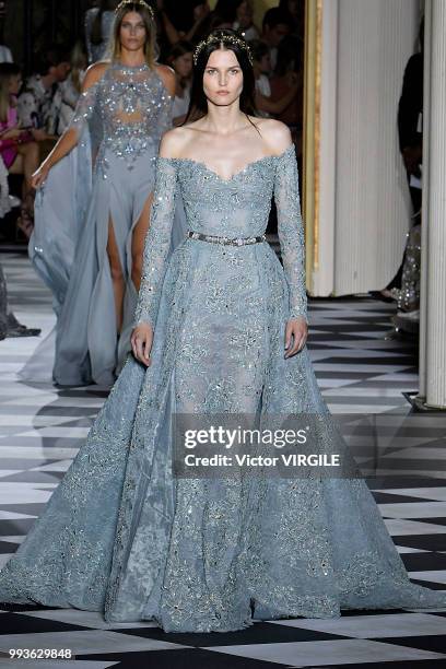 Model walks the runway during the Zuhair Murad Haute Couture Fall Winter 2018/2019 fashion show as part of Paris Fashion Week on July 4, 2018 in...