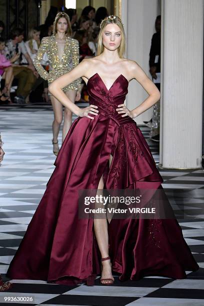 Model walks the runway during the Zuhair Murad Haute Couture Fall Winter 2018/2019 fashion show as part of Paris Fashion Week on July 4, 2018 in...