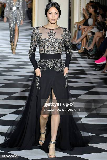 Model walks the runway during the Zuhair Murad Haute Couture Fall Winter 2018/2019 fashion show as part of Paris Fashion Week on July 4, 2018 in...