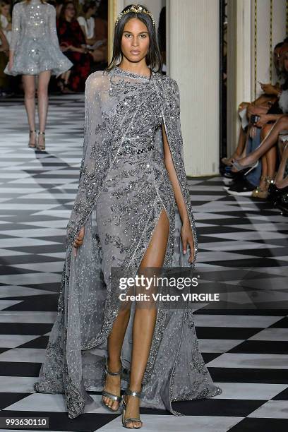 Cindy Bruna walks the runway during the Zuhair Murad Haute Couture Fall Winter 2018/2019 fashion show as part of Paris Fashion Week on July 4, 2018...