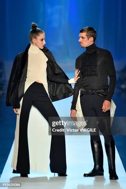 Anna Cleveland and a model walk the runway during the Jean-Paul Gaultier Haute Couture Fall Winter 2018/2019 fashion show as part of Paris Fashion...