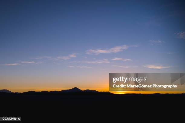 sunset at the salar - salar stock pictures, royalty-free photos & images