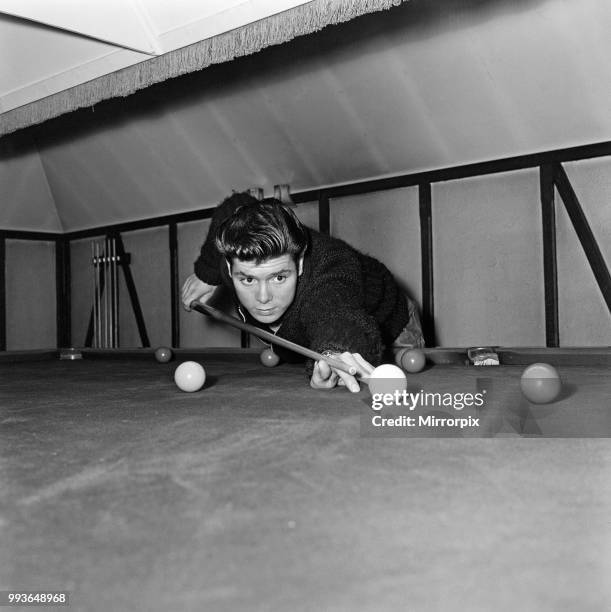 Cliff Richard at his tudor style mansion at Upper Nazeing, Essex. He will live there with his mother and two sisters Jackie 16 and Joan 13. It has...