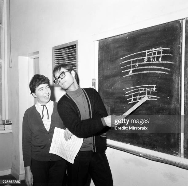 Pop star Cliff Richard back at his old school, Cheshunt Secondary in Hertfordshire. Talking with his old drama teacher Mrs. Jay Norris, 8th December...