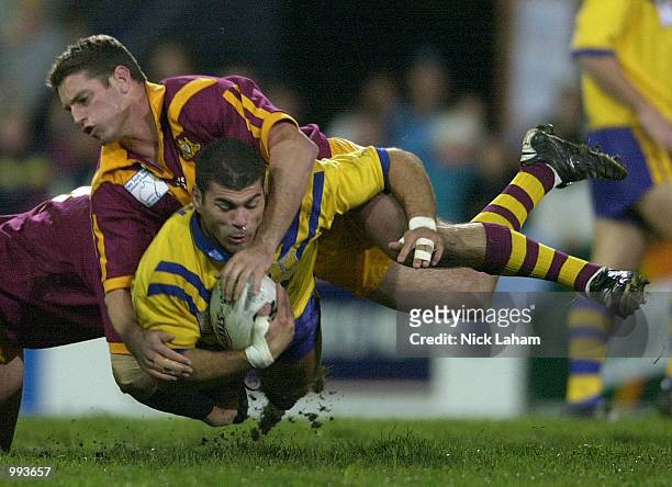 Danny Buderus of Country wraps up Ian Rubin of City during the NRL Origin match between Country and City held at Carrington Park, Bathurst,...