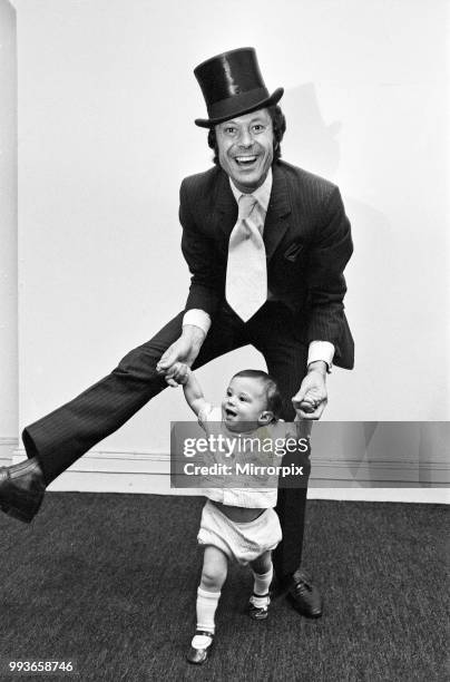 Lionel Blair giving dancing tuition to his 10-month-old son Daniel, 23rd June 1969.