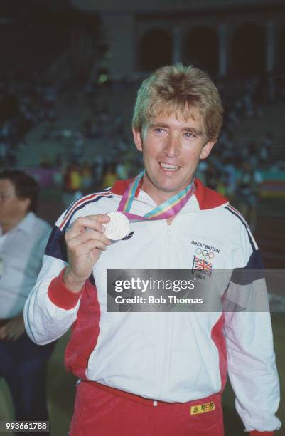 English athlete David Ottley of the Great Britain team celebrates after finishing in second place to win the silver medal in the Men's javelin throw...