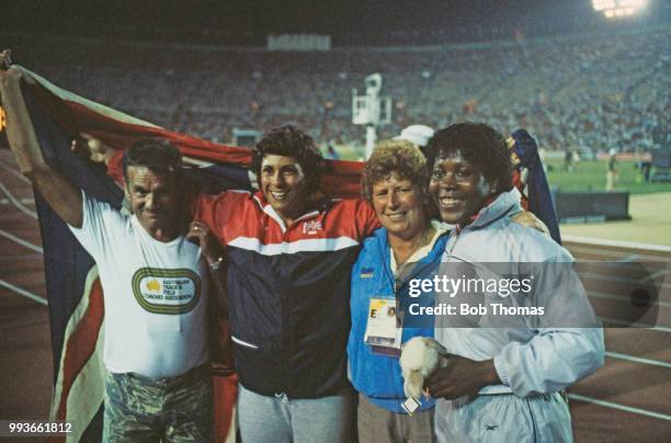 English javelin throwers Tessa Sanderson and Fatima Whitbread of the Great Britain team pictured celebrating with their coaches Wilf Paish and...