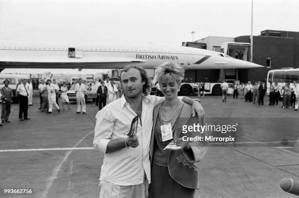 Singer Phil Collins & wife Jill Travelman at London Heathrow Airport. Phil Collins is about to board a Concorde flight to USA, in order to perform at...