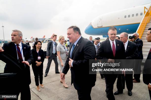 Secretary of State Mike Pompeo arrives at Nom Bar International Airport in Hanoi on July 8, 2018. - Pompeo shrugged off North Korean accusations of...