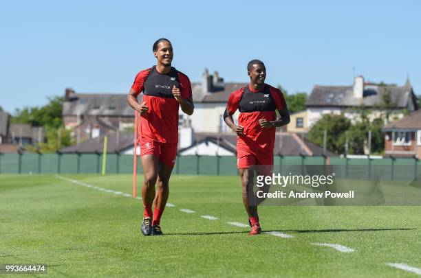 Virgil van Dijk and Georginio Wijnaldum of Liverpool during the first day back at Melwood Training Ground on July 8, 2018 in Liverpool, England.