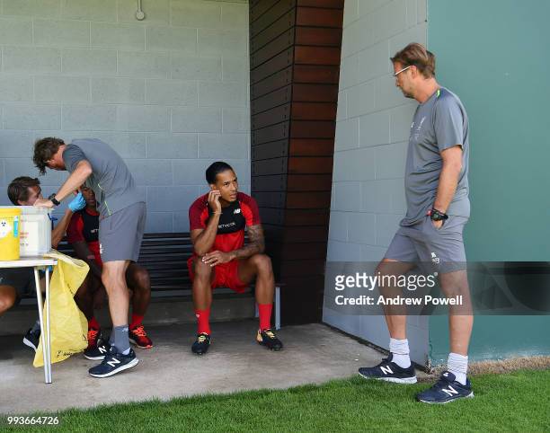 Virgil van Dijk of Liverpool talking with manager of Liverpool Jurgen Klopp during the first day back at Melwood Training Ground on July 8, 2018 in...