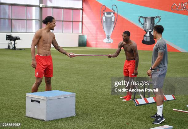 Virgil van Dijk and Georginio Wijnaldum of Liverpool during their first day back at Melwood Training Ground on July 8, 2018 in Liverpool, England.