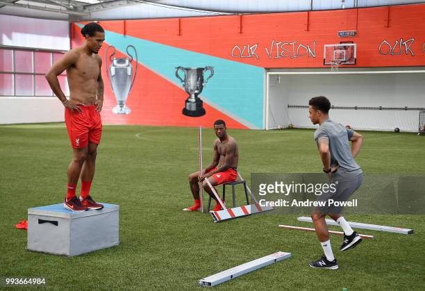 Virgil van Dijk and Georginio Wijnaldum of Liverpool during their first day back at Melwood Training Ground on July 8, 2018 in Liverpool, England.