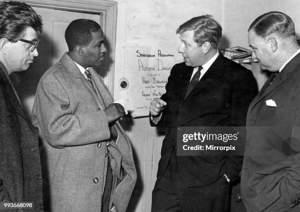 Member of Parliament for Birmingham Sparkbrook Roy Hattersley, third from left, speaking to Valentine Cato, Chairman of the West Indian Welfare...