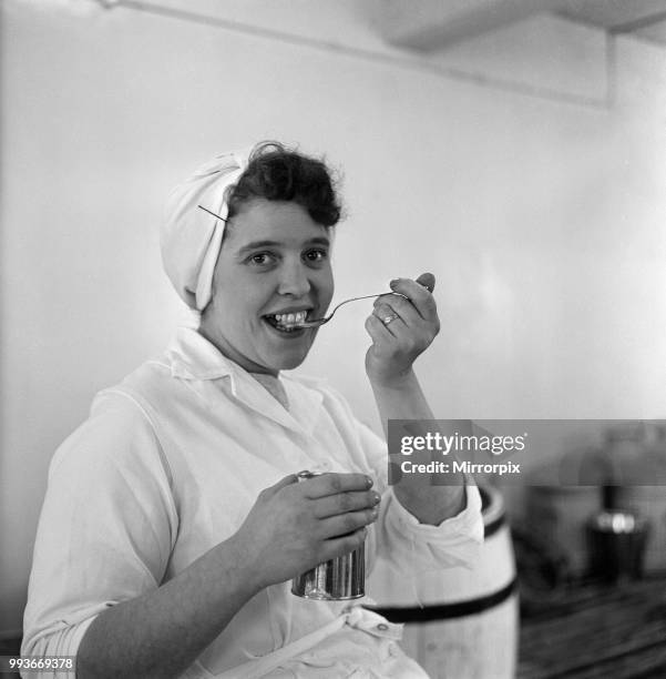 Scenes inside Robinson's Tripe factory in Hull. Doreen Spaven eats any left overs, 3rd October 1966.