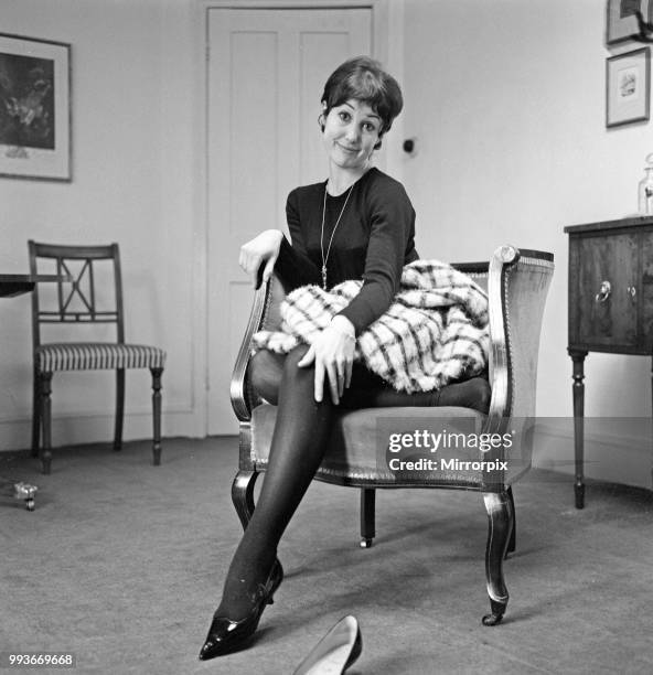 Dancer Una Stubbs, aged 22, in her flat in London, 4th December 1959.