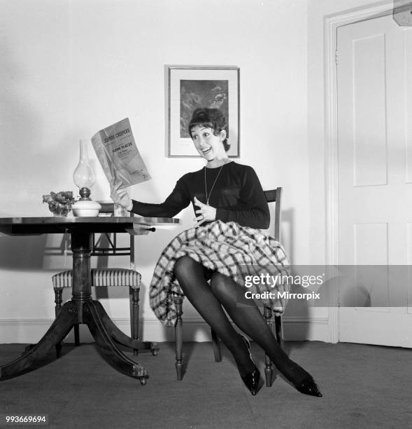 Dancer Una Stubbs, aged 22, in her flat in London, 4th December 1959.