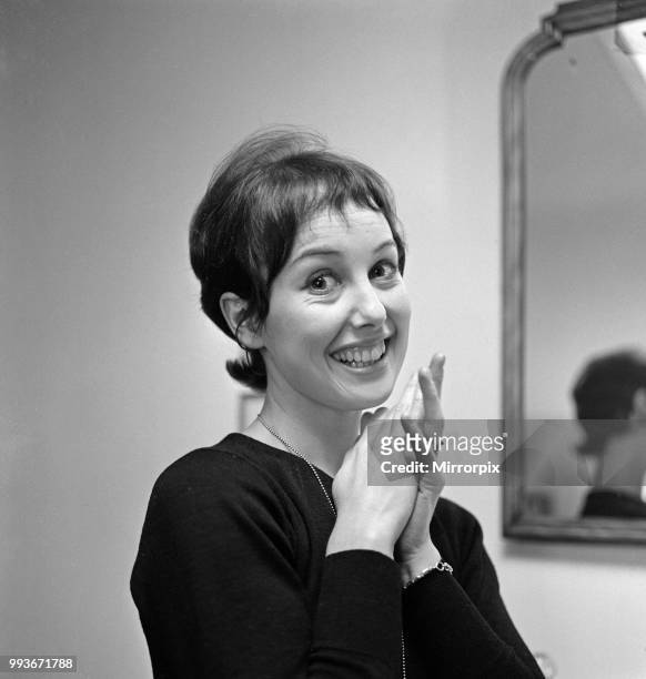 Dancer Una Stubbs, aged 22, in her flat in London, 4th December 1959.