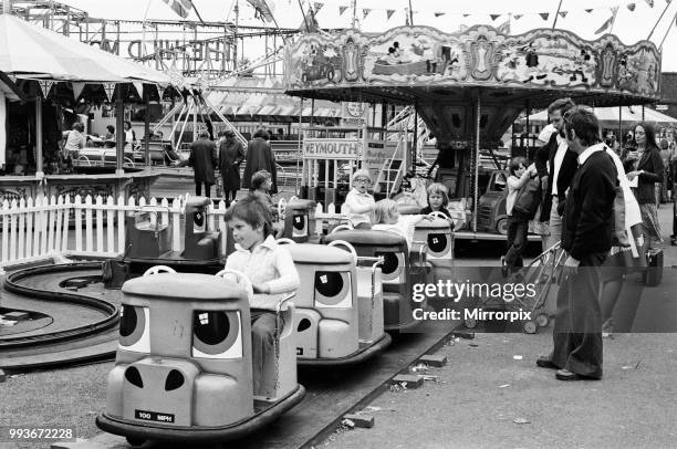 Scenes at Weymouth Fairground, Dorset, 14th July 1977.